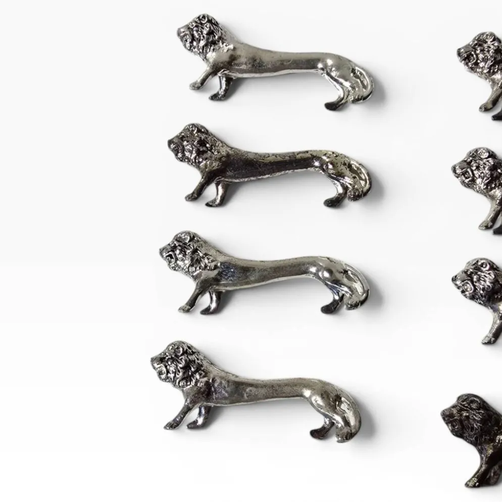 Series of antique knife rests in the shape of a lion, silver-plated metal.