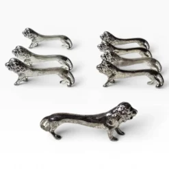 Series of antique knife rests in the shape of a lion, silver-plated metal.