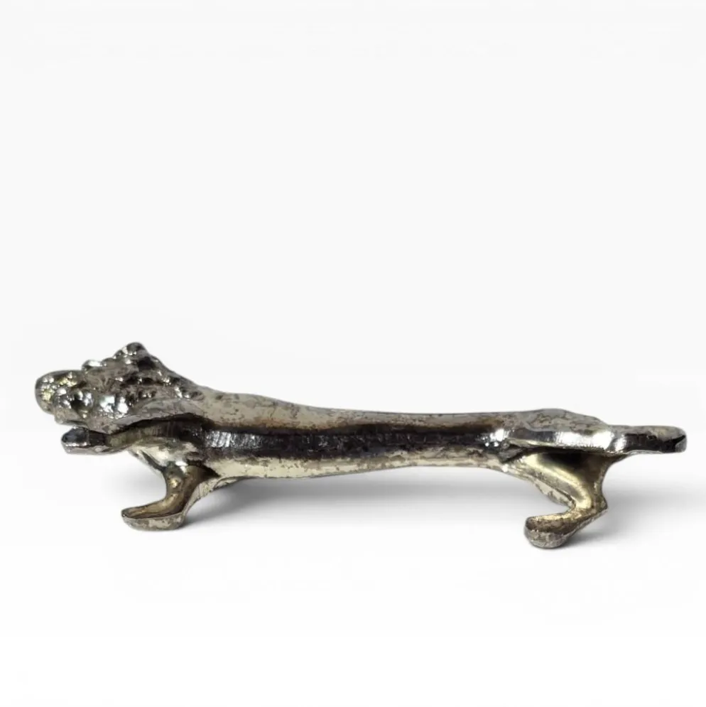 Series of antique knife rests in the shape of a lion, silver-plated metal.