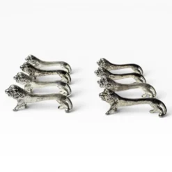 Series of antique knife rests in the shape of a lion, silver-plated metal.