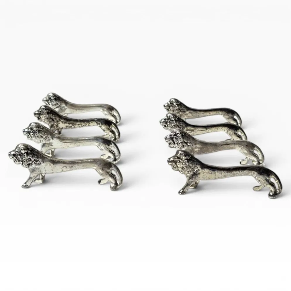 Series of antique knife rests in the shape of a lion, silver-plated metal.