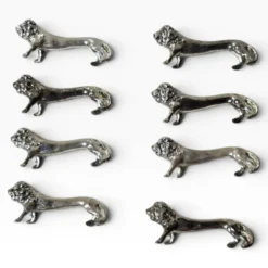 Series of antique knife rests in the shape of a lion, silver-plated metal.