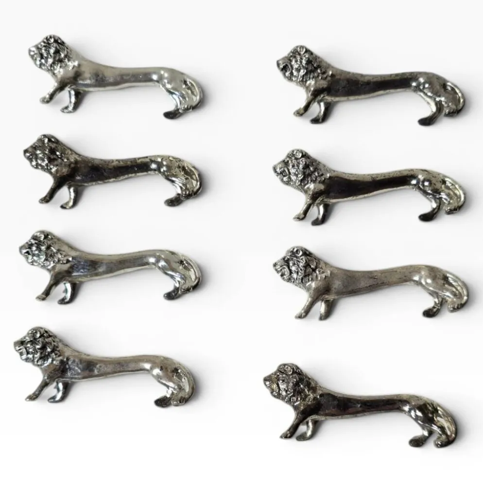 Series of antique knife rests in the shape of a lion, silver-plated metal.