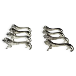 Series of antique knife rests in the shape of a lion, silver-plated metal.