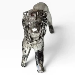 Series of antique knife rests in the shape of a lion, silver-plated metal.