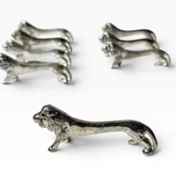 Series of antique knife rests in the shape of a lion, silver-plated metal.