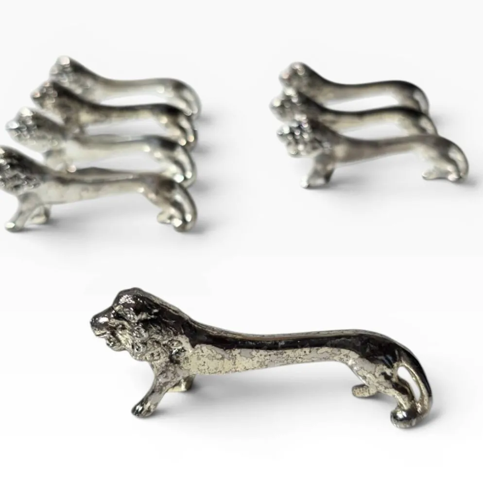 Series of antique knife rests in the shape of a lion, silver-plated metal.