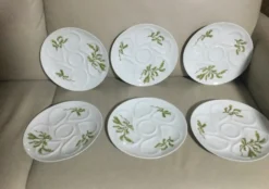 Service de six assiettes à huîtres en porcelaine de Limoges