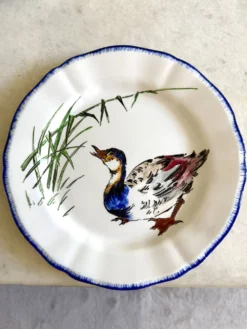 Service de table assiettes et plats Gien modèle grands oiseaux