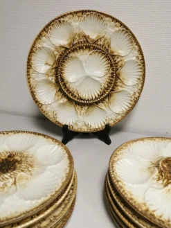 Service à huitres / coquillages vintage de 10 assiettes + 1 plat en faience de longchamp france
