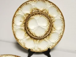 Service à huitres / coquillages vintage de 10 assiettes + 1 plat en faience de longchamp france