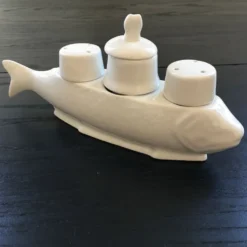 Serviteur poisson sel et poivre
