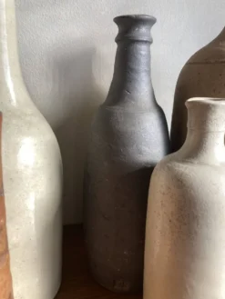 Set de 6 bouteilles de grès et terre cuite 1900-1930