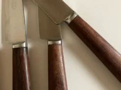 Set de 9 couteaux à manche de bois de palissandre mid century