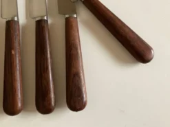 Set de 9 couteaux à manche de bois de palissandre mid century