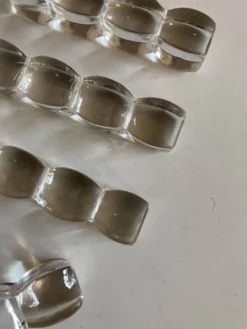 Set de 8 porte couteaux coussins modernistes en cristal sonnant 1940