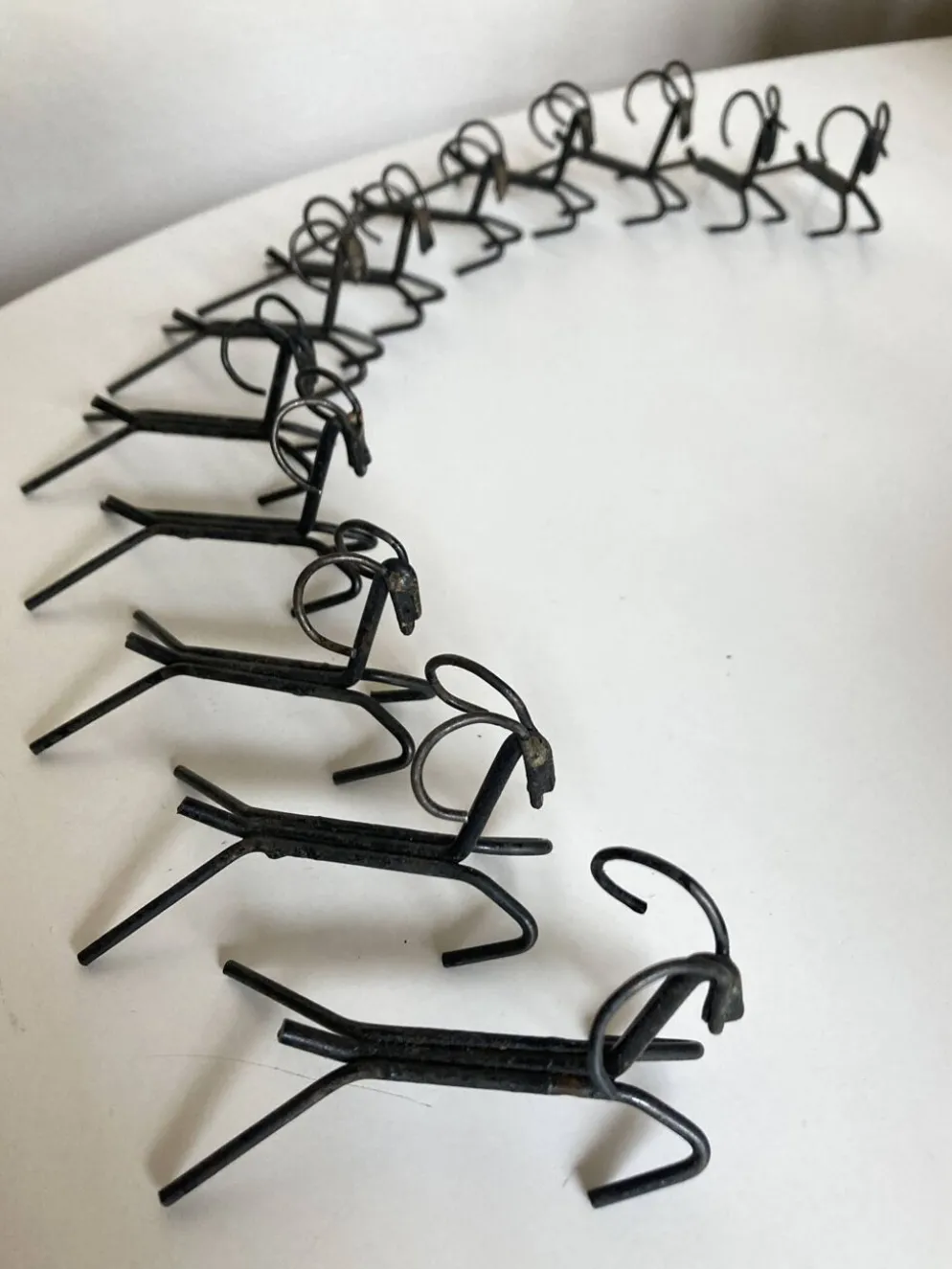 Set de 12 porte couteaux en fer brut 1970