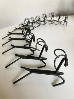 Set de 12 porte couteaux en fer brut 1970