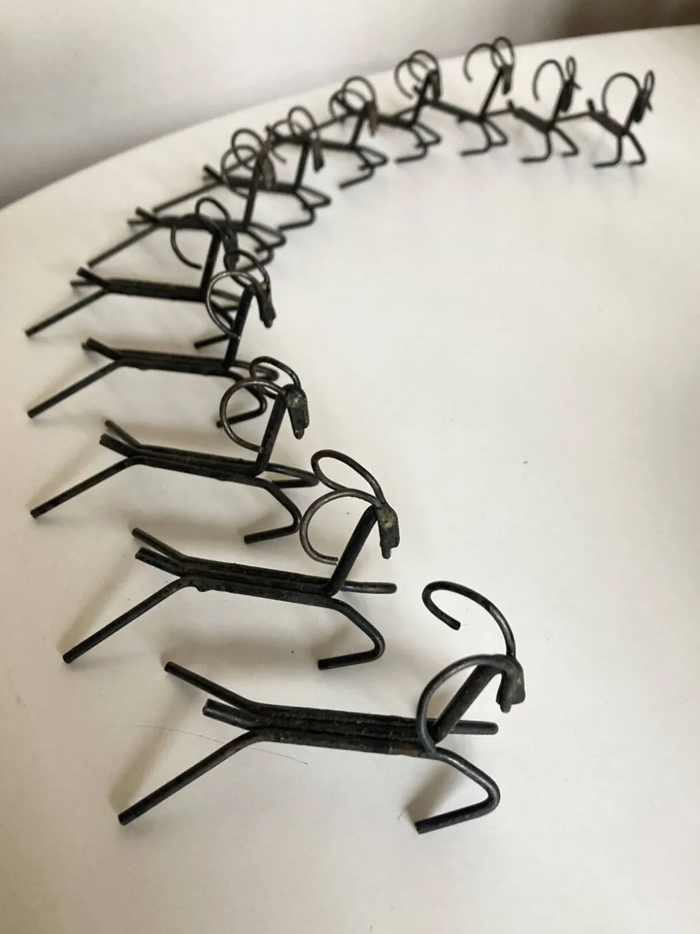 Set de 12 porte couteaux en fer brut 1970