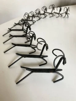 Set de 12 porte couteaux en fer brut 1970