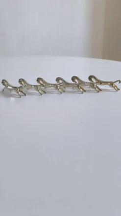 Set de 6 porte-couteaux en métal argenté
