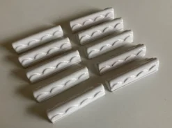 Set de 10 porte couteaux festons enterre vernissée Pierre Motton à Gien 1960