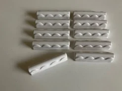 Set de 10 porte couteaux festons enterre vernissée Pierre Motton à Gien 1960