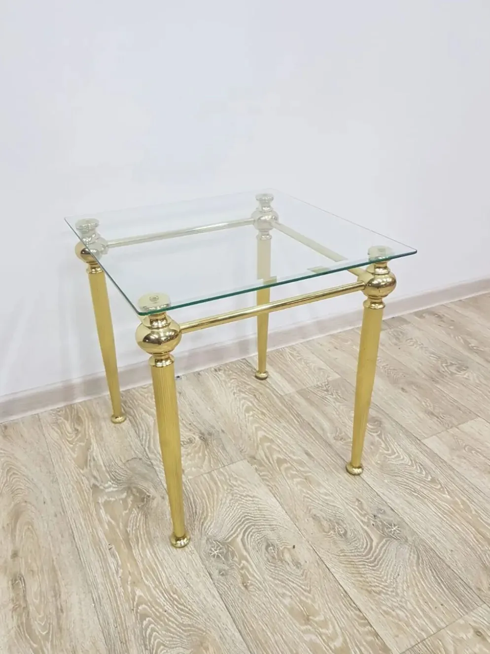 Side table, gold-tone brass, clear glass, France, 1960s.