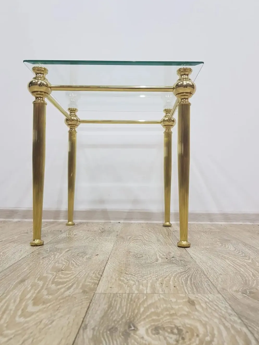 Side table, gold-tone brass, clear glass, France, 1960s.