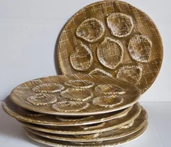 Six assiettes à huîtres faïence à l'émail mat, années 50