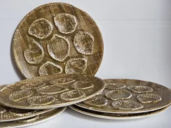 Six assiettes à huîtres faïence à l'émail mat, années 50