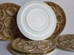 Six assiettes à huîtres faïence à l'émail mat, années 50