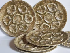Six assiettes à huîtres faïence à l'émail mat, années 50
