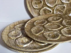 Six assiettes à huîtres faïence à l'émail mat, années 50