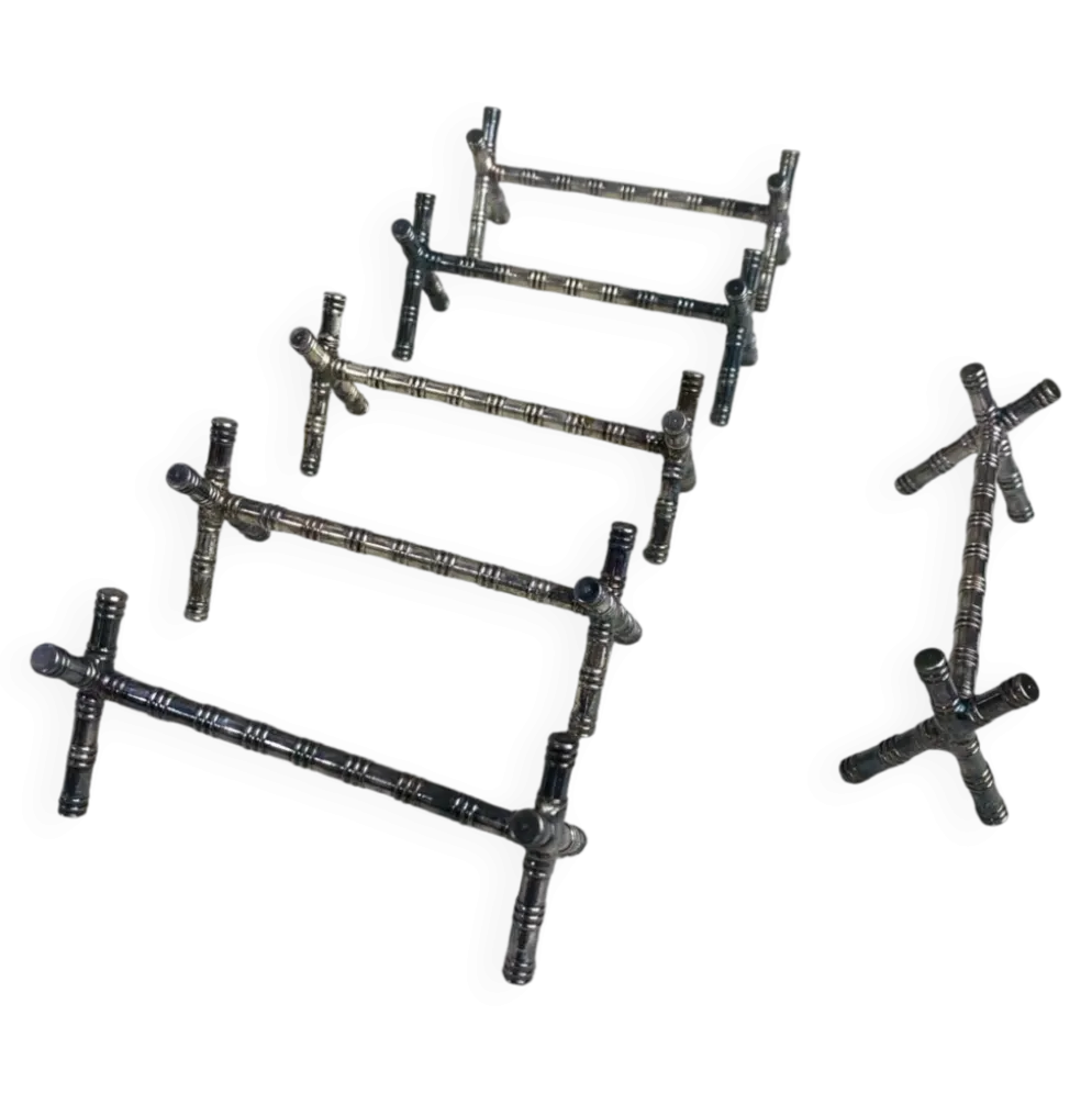 Six porte-couteaux tréteaux, motif bambou, métal argenté