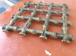Sous plat en bronze façon bambous vers 1960