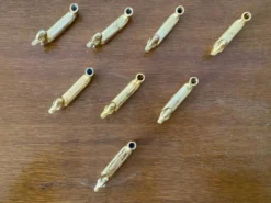 Série de 8 anciens portes couteaux privilège metal doré canard vintage