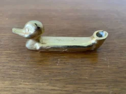 Série de 8 anciens portes couteaux privilège metal doré canard vintage