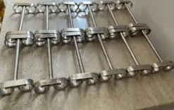 Série de 12 porte couteau vintage en inox