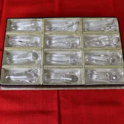 Série de 12 porte couteaux Art Déco en cristal par Christian Eldé