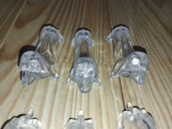 Série de 12 porte-couteaux Danone – Chiens – Bakélite / plastique dur – Ann