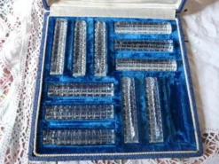 Série de 11 porte couteaux dans leur coffret