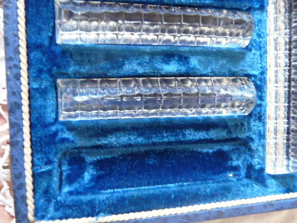 Série de 11 porte couteaux dans leur coffret