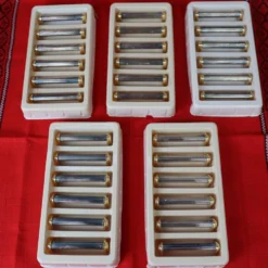 Série de 6 porte couteaux en métal argenté et doré