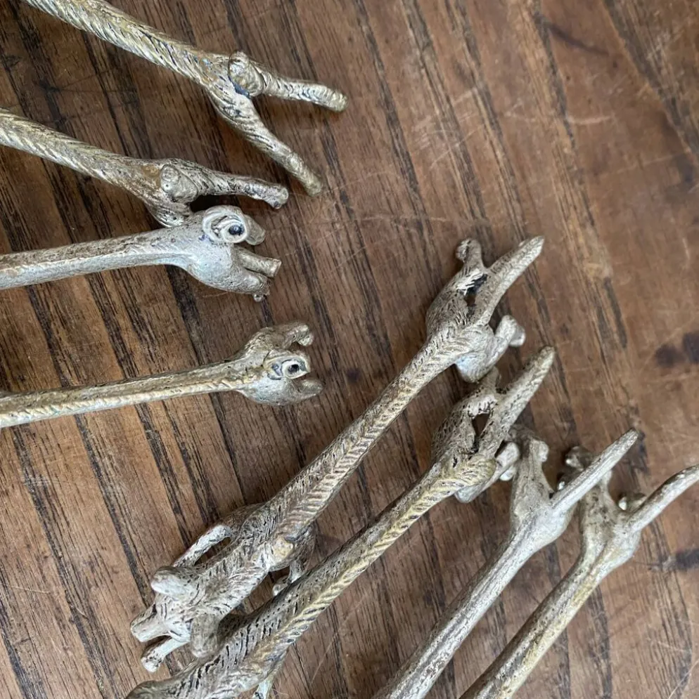 Suite de 8 porte-couteaux anciens en métal argenté Animaux