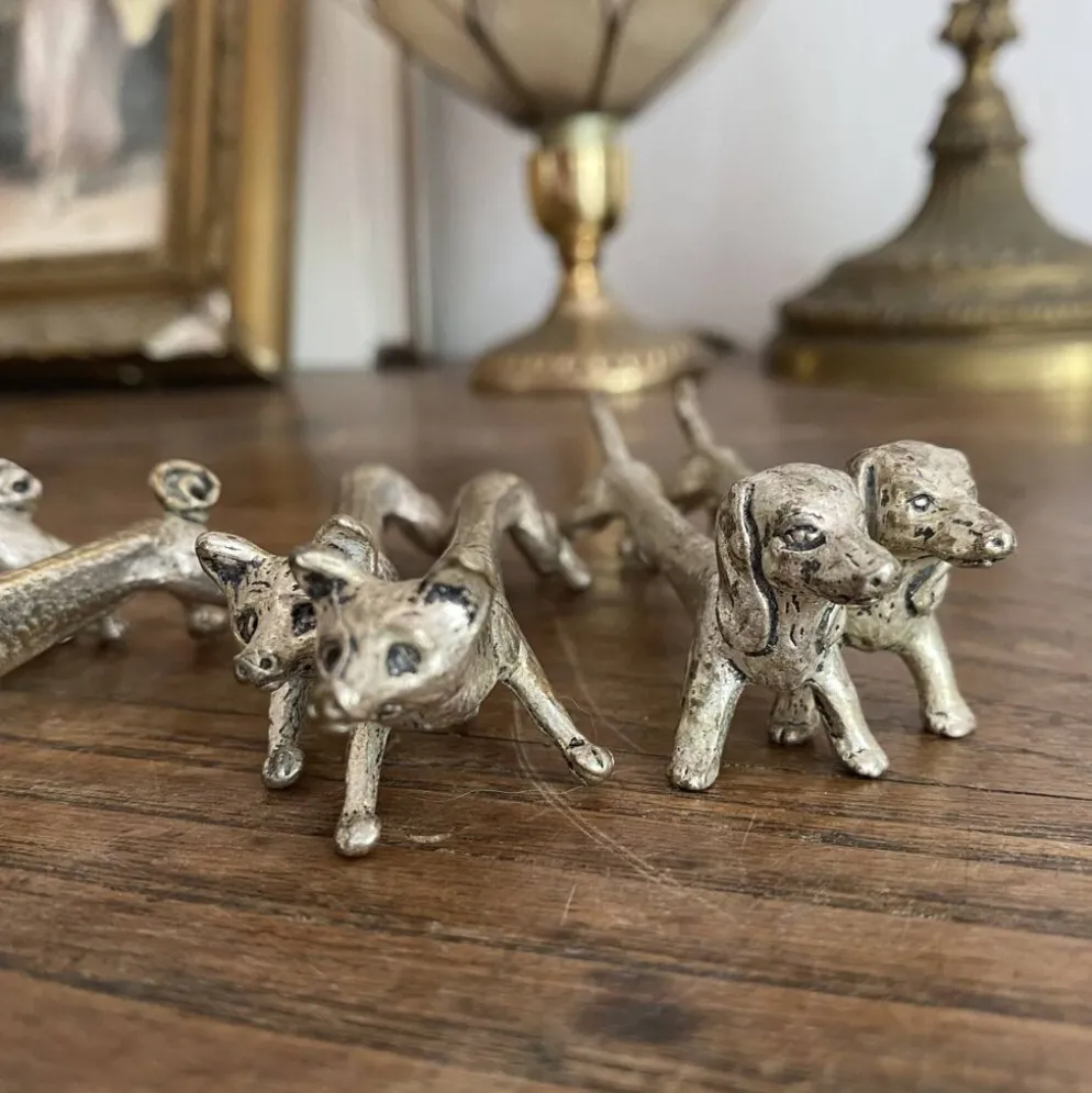 Suite de 8 porte-couteaux anciens en métal argenté Animaux