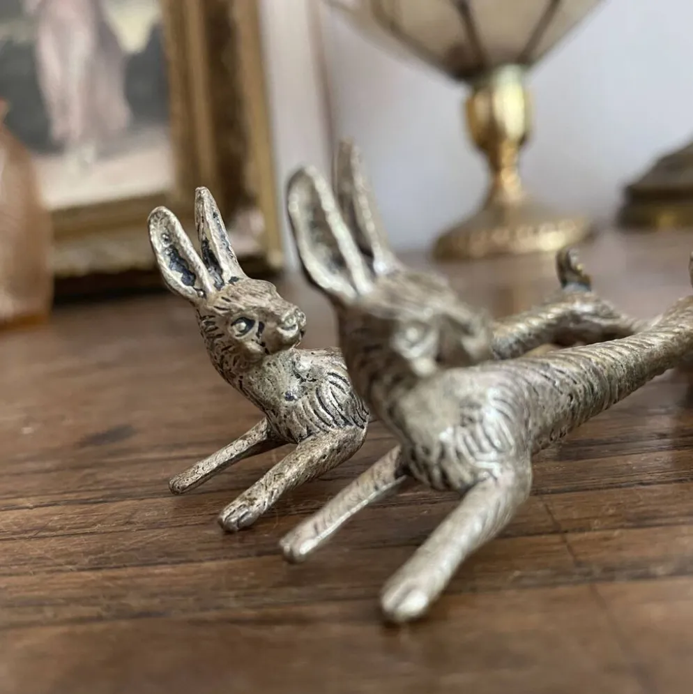 Suite de 8 porte-couteaux anciens en métal argenté Animaux