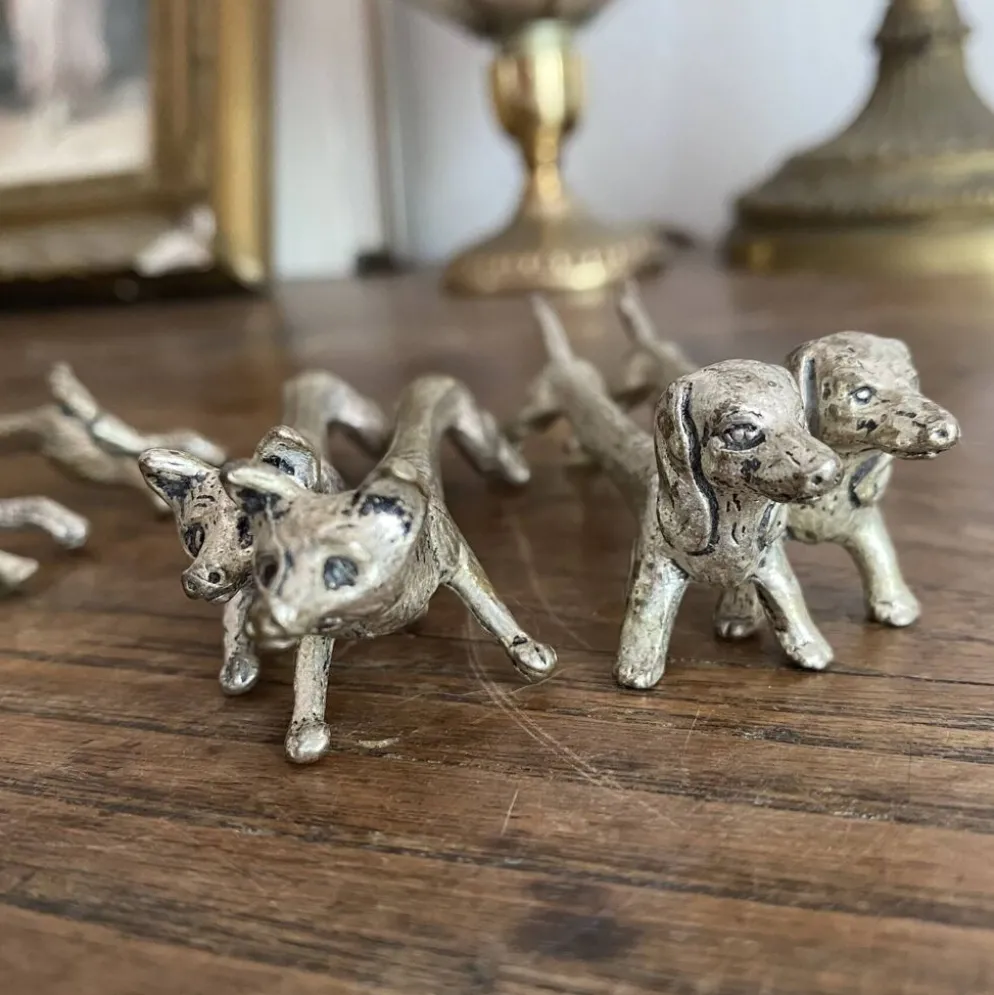 Suite de 8 porte-couteaux anciens en métal argenté Animaux