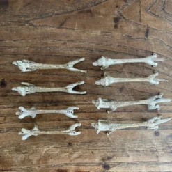 Suite de 8 porte-couteaux anciens en métal argenté Animaux