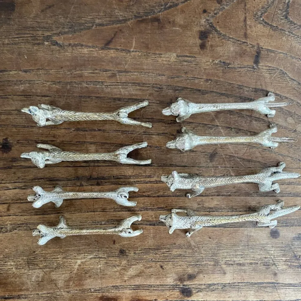 Suite de 8 porte-couteaux anciens en métal argenté Animaux
